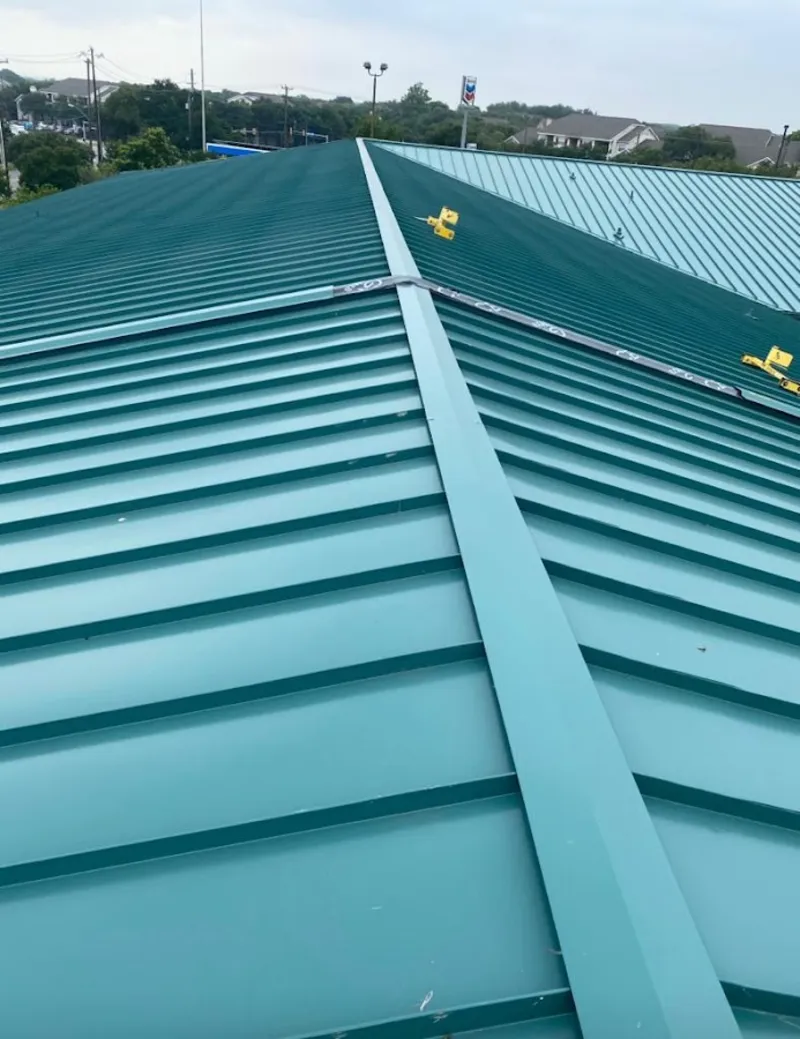 Green commercial metal roof ridge and valley for Metal Roof Repair in Fairbanks