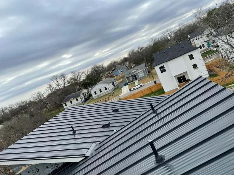 Standing seam metal roof panels with vents for Skylight Repair in Fairbanks